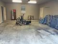 Original garage, you can see old florescent lights but photo doesn't show the garage door motor and rails that were removed.