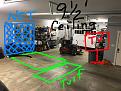 Option 2
My wife’s SUV typically sets in this area, but will be moved when use. 

Neither option is a dedicated full time stationary area, need to set up every time I practice. My tv idea is to place it on a movable type stand.