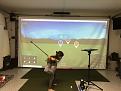 6 year old daughter practicing on par2pro HQSQ screen held up by sportscreen