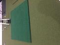 Quattro hitting mat on top of putting green causes wrinkles on putting turf behind hitting mat.