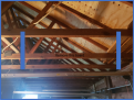I'm hoping to cut out the center beam and replace it with two cross beams (in blue).