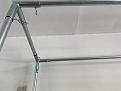 Purchased EMT pipe at Lowes and the connectors at Ace to create the screen cage.