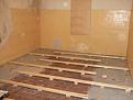 Subfloor sleepers being installed and levelled