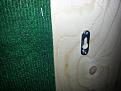 Hidden fastener used to hang wall panels - hooks on to screw head protruding from wall battens